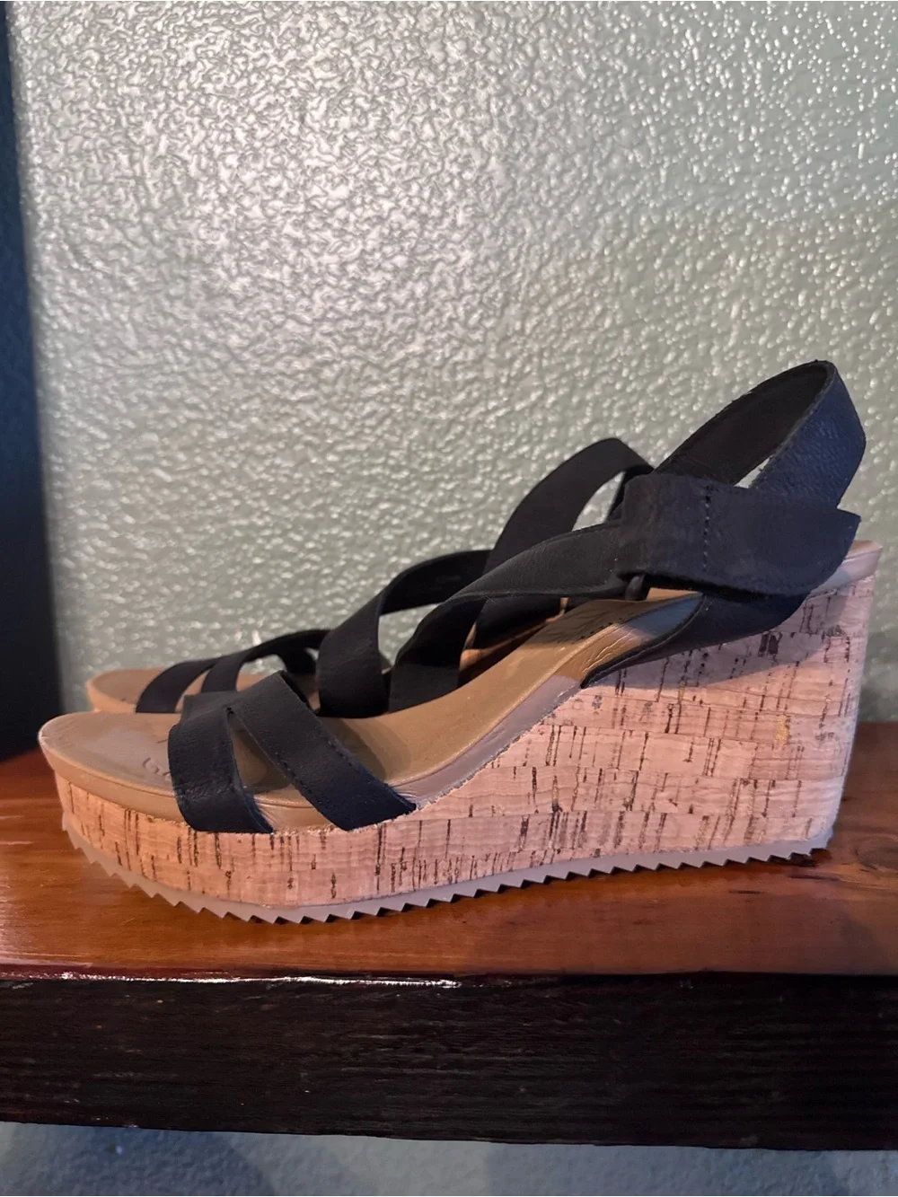 Black and tan CL by Laundry sandals featuring a cross strap and cork style heels